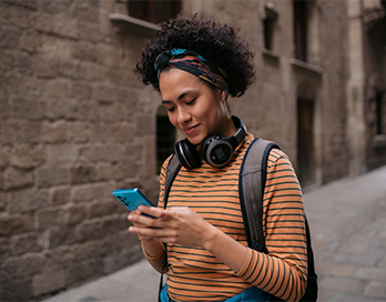 Women on the go checking her banking app